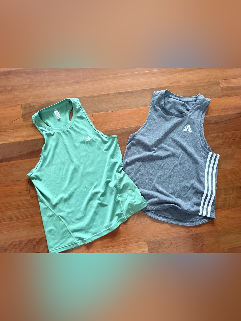 2 adidas tank tops